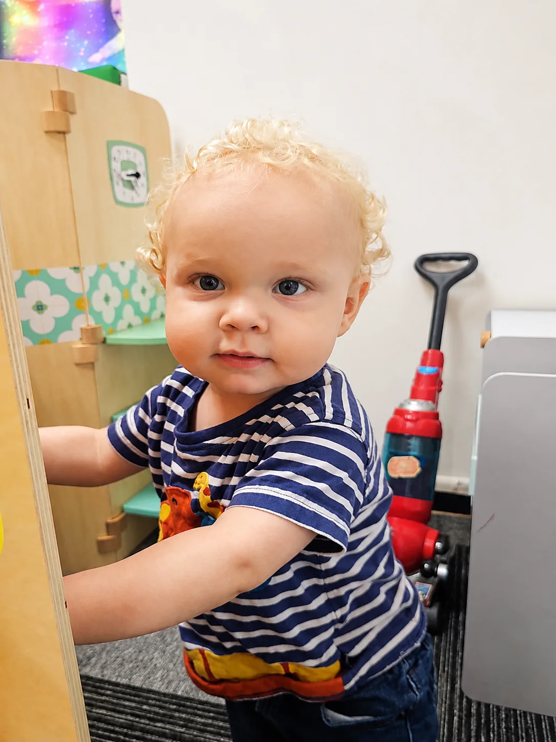 Young child exploring role play